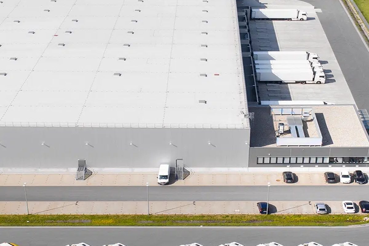 Commercial TPO membrane roof installation on a Kansas City low-slope building